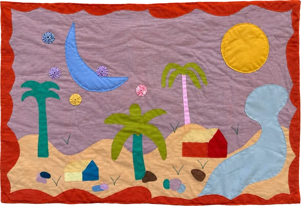 Landscape quilt with a red border, blue moon, sun, palm trees and little houses beside a river.
